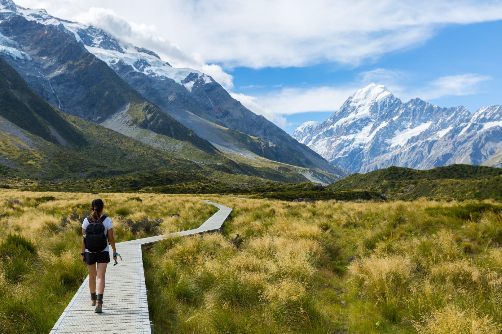 A hiker on the Hooker Valley Track, Mount Cook, New Zealand