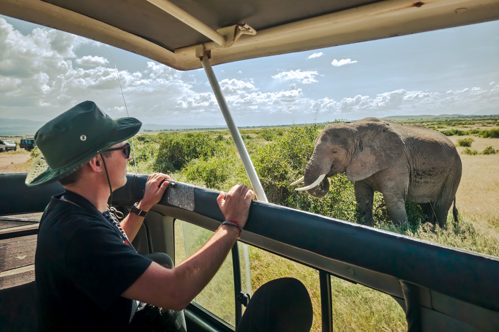 A tourist on a family safari in Kenya