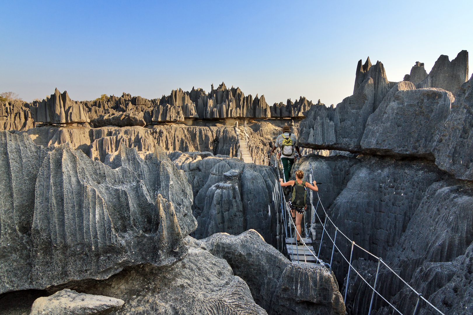 A traveler with a guide in Tsginy, Madagascar