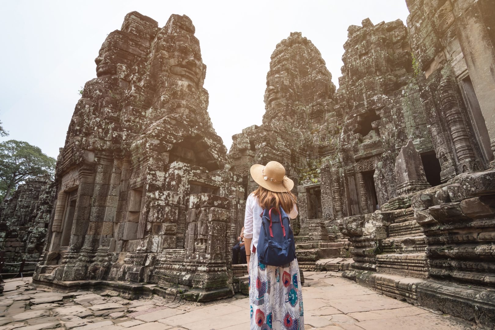 A traveler exploring the temples of Angkor Wat, Cambodia