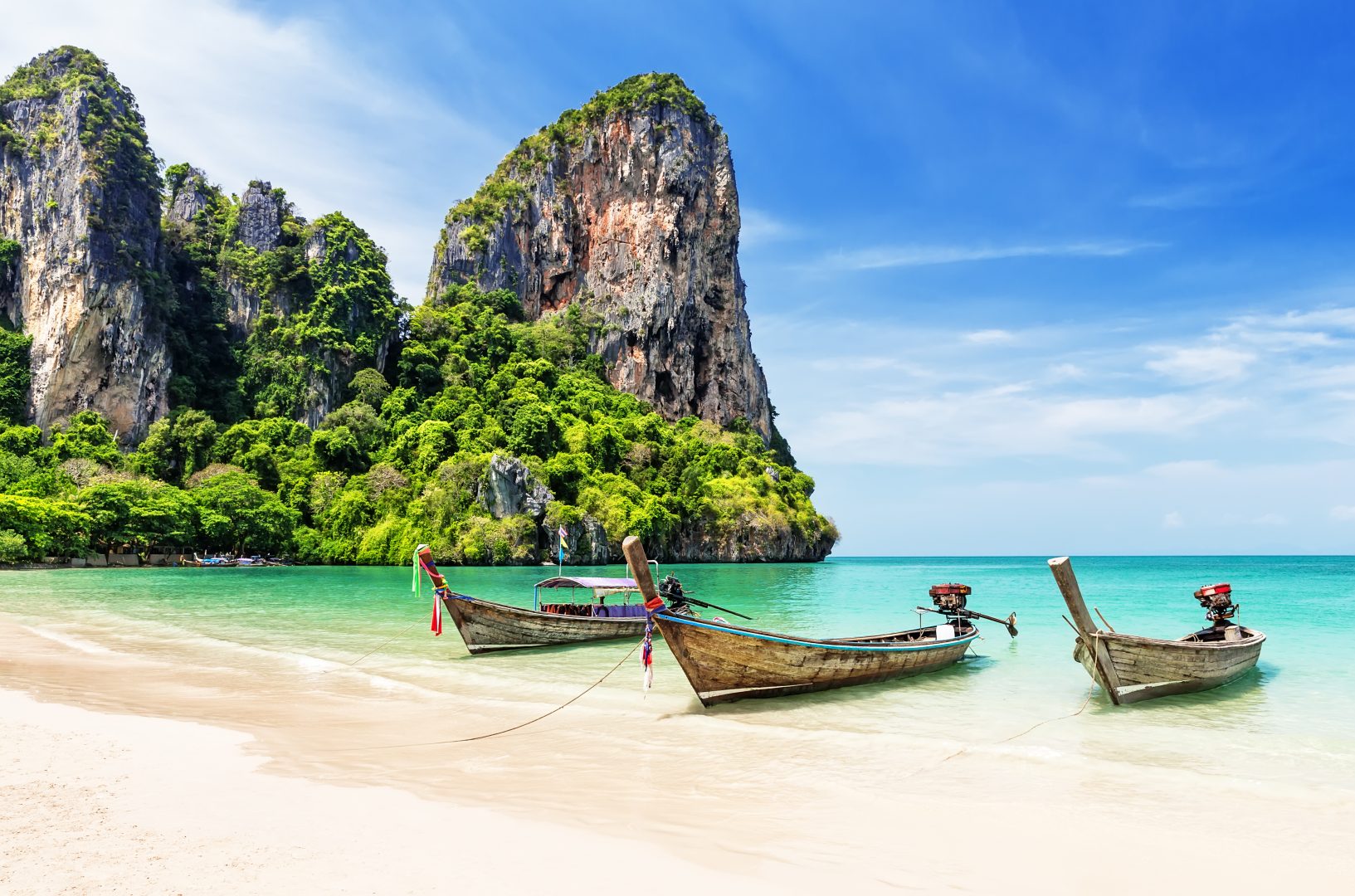 Longtail boats on a beach in Thailand