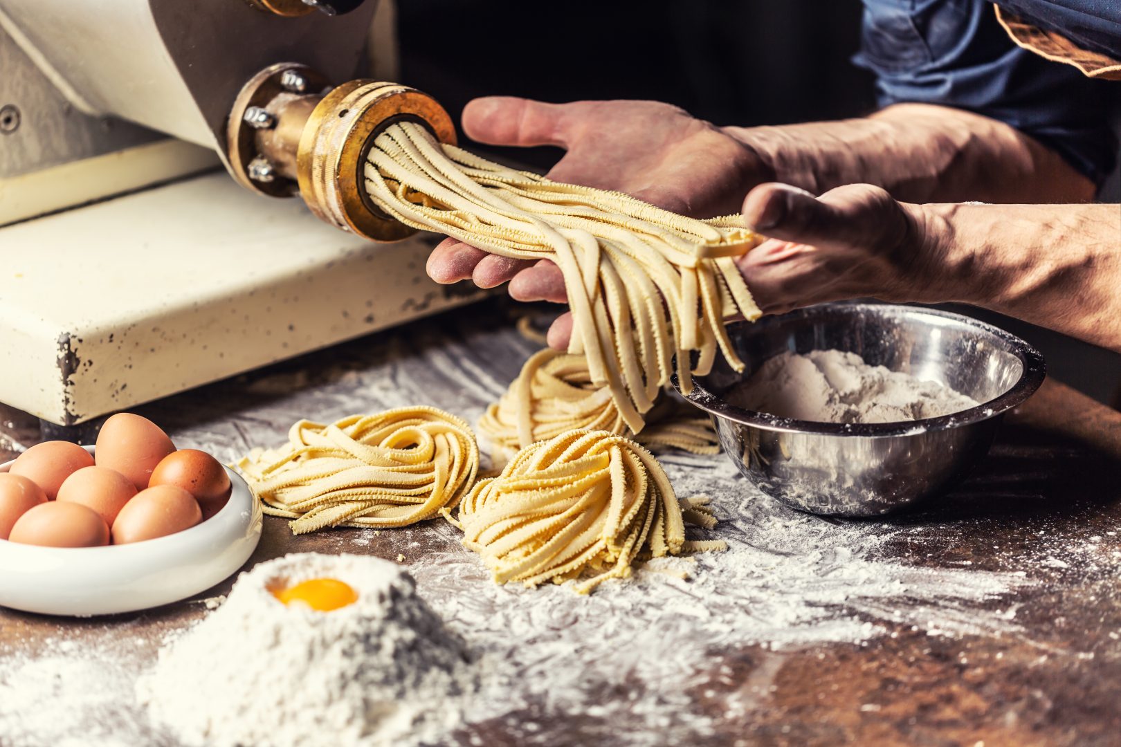 Cooking Sicilian pasta at a cooking class in Italy