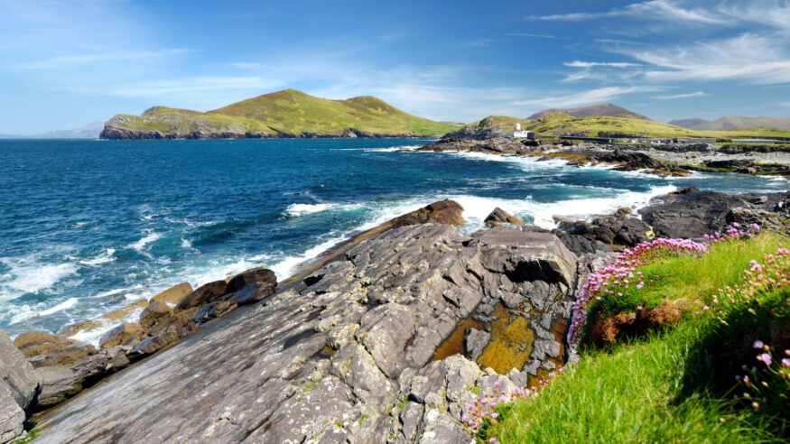 Beautiful view of Valentia Island Lighthouse at Cromwell Point. Locations worth visiting on the Wild Atlantic Way. Scenic Irish countyside on sunny summer day, County Kerry, Ireland.